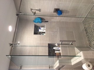 High+end+sliding+shower+enclosure+with+custom+configuration+installed+in+Raleigh+NC