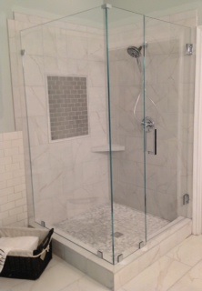 Seamless corner shower featuring upgraded low iron 3/8" glass and modern polished chrome hardware. Raleigh, Cary, Durham, Chapel Hill, Wake Forest 90 degree full glass panel frameless shower enclosure using low iron glass