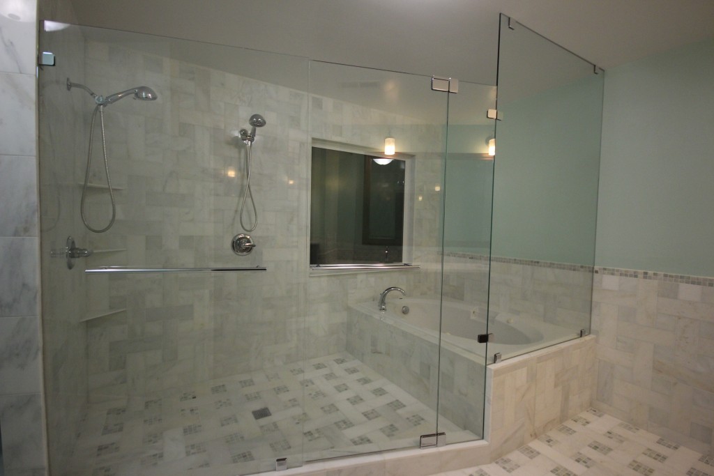 Custom shower door with tub enclosed in wet room – Mia Shower Doors