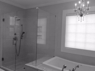 Timeless and classic corner shower with minimal metal